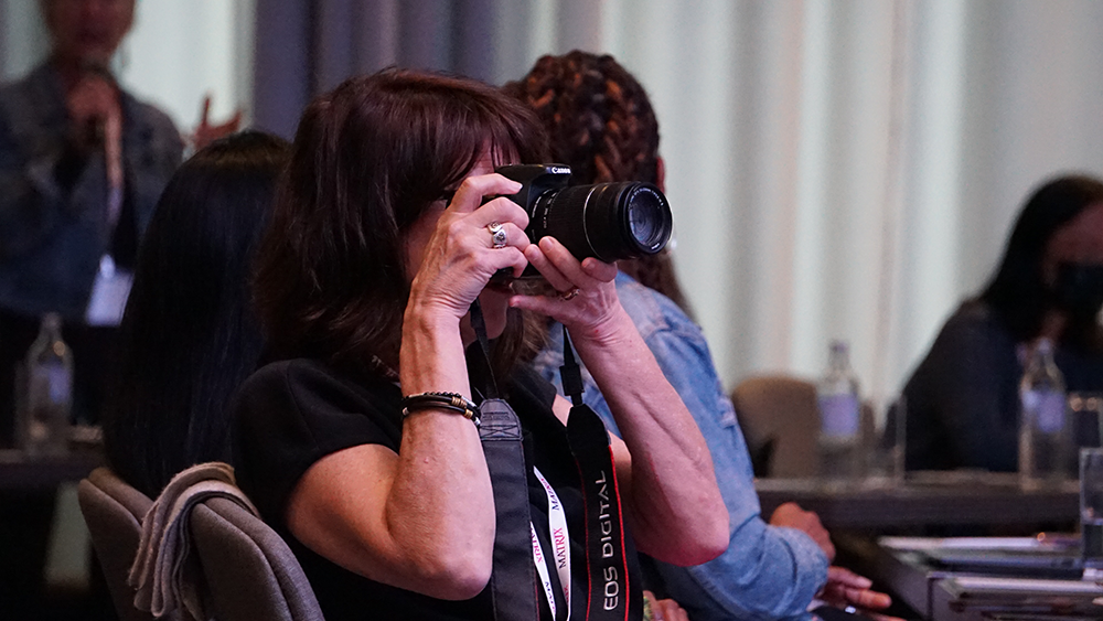 Photographer during a meeting