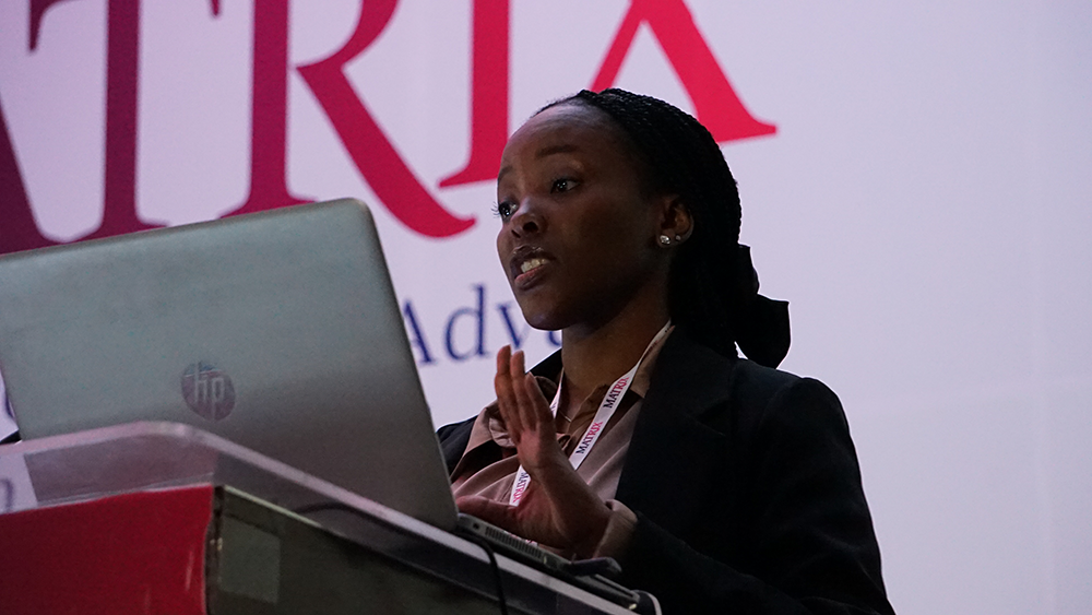 Person speaking at the podium