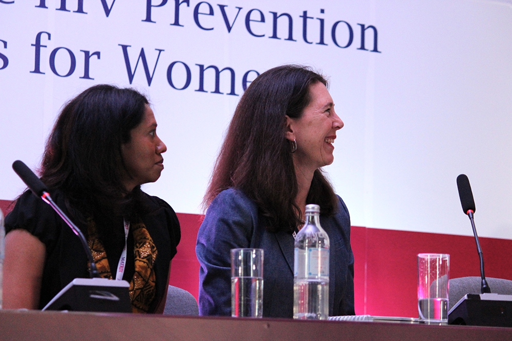 Panelists listening to a presentation