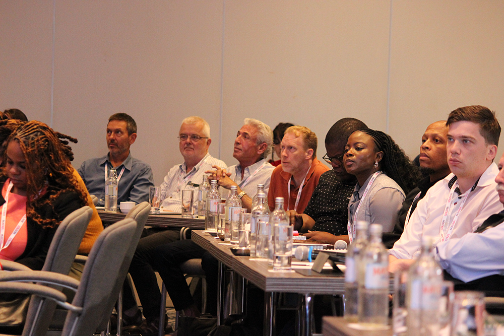 Audience listening to a presentation during a meeting