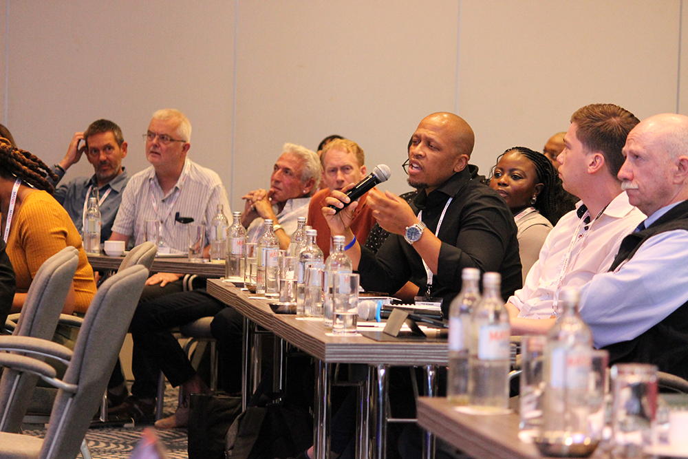 Audience listening to a presentation during a meeting