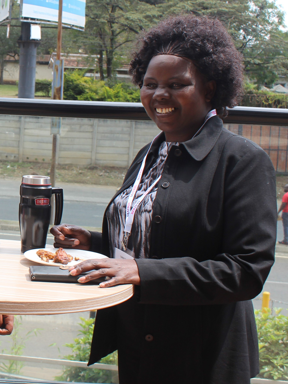 Person smiling during a tea break